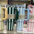 Stanley Tumbler 40oz (1200ml) – Stainless Steel Travel Mug with Striped Design. 