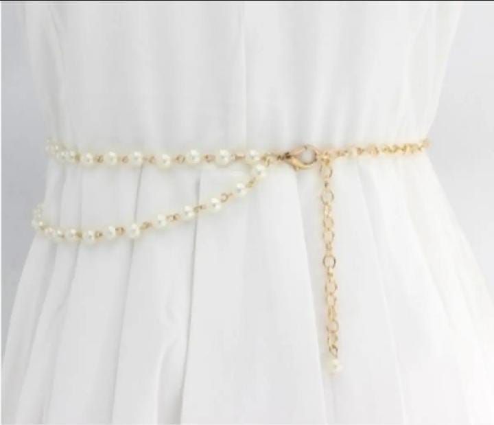 Elegant white pearls and golden chain belt for stylish girls