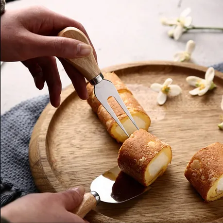 Set%20Of%204-%20Cheese%20Knives%20with%20Bamboo%20Wood%20Handle-%20Stainless%20Steel%20Cheese%20Spreader%20Cutter%20Knives%20-%20%20Cheese%20Slicer%20and%20Butter%20Cutter-%20%20Cheese%20Knife%20Set%20for%20Cheese%20serving.%20-%20Image%203