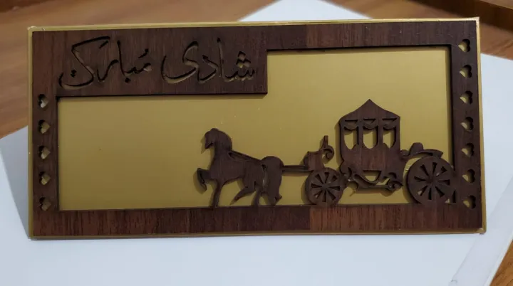 Elegant%20Golden%20color%20Wooden%20frame%20Greeting%20card%20Envelopes,%20Shadi%20Mubarak%20written%20in%20Urdu,%20stylish%20design%20of%20wooden%20frame%20of%20%E2%80%9CShadi%20Mubarak%E2%80%9D%20on%20finest%20golden%20color%20chemical%20coated%20cardboard%20envelope,%20double%20taped.%20-%20Image%204