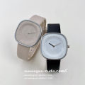 Niche design art creative temperament watch female student Japanese minimalist milk tea milk sugar cube ins fashion watch. 