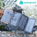 A ADDTOP Solar Charger Power Bank - 25000mAh Portable Solar Phone Charger with 4 Solar Panels & Dual 2.1A USB A Outputs External Battery Pack for Phones Tablets Outdoor Camping Black & Orange. 