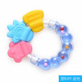 Rattle Shape Silicone Baby Teether – Soft & Safe Teething Toy for Infants – BPA-Free, Non-Toxic, and Easy to Grip. 
