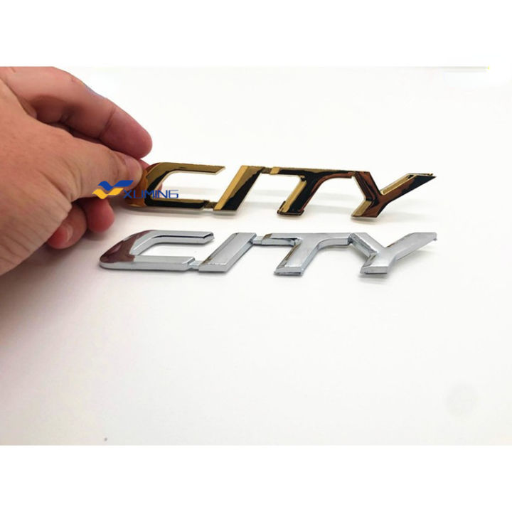 Honda Gold/Chrome City rear gold emblem logo