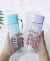 Square Transparent Plastic Water Bottle with Frosted Finish and Carry Loop. 