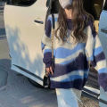Contrast striped sweater for women with a lazy and loose soft long sleeved knitted top. 
