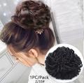 Synthetic Hair Bun - Black. 