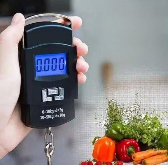 Digital%20Hanging%20Weighing%20Scale%20%E2%80%93%20Portable%20Heavy-Duty%20LCD%20Display%20Weight%20Machine%20with%20Hook%20for%20Kitchen,%20Meat,%20Luggage,%20and%20Market%20Use%20%7C%7C%20Galaxy%20Bazaar%20-%20Image%203