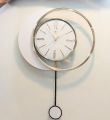 FANCY AND ELEGANT TRANSPARENT GLASS WALL CLOCK ALONG WITH SIDE MOON SHAPE WITH STYLISH LONG PENDULUM  ATTRACTIVE WALL CLOCK STYLISH DESIGN SMOOTH MACHINE WALL CLOCK HANGING WALL CLOCK HOME DECORATION PERFECT FOR YOUR MODERN LIVING ROOM. 