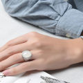 White gold-plated large oval cabochon white jade coin ring Imitation Hetian jade inlaid white jade ring. 