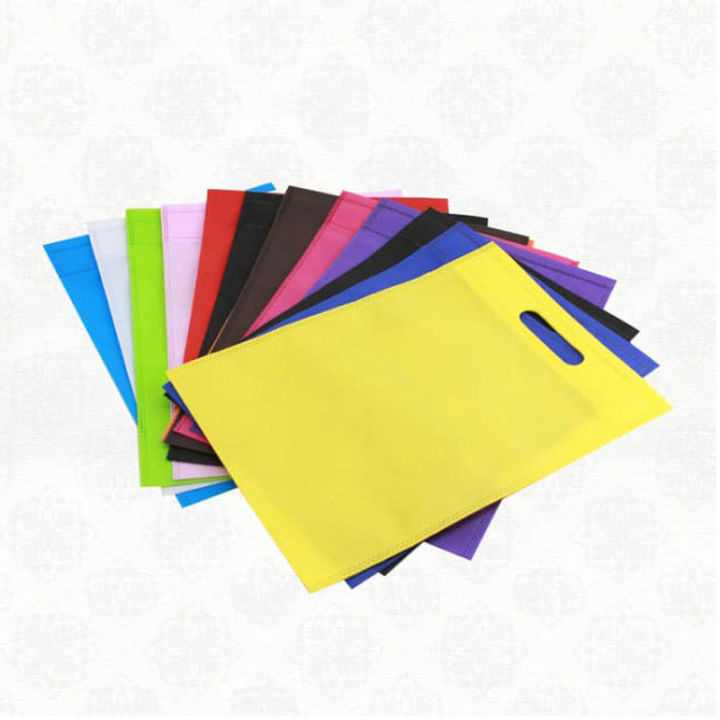 Bundle%20of%20100%20piece%20Shopping%20Bag%20D%20Cut%20Style%2010x12%20size%20non%20woven%20material%20-%20Image%203