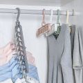 Multiple Clothes Hanger Space Saving Wardrobe Organizer with 9 Holes for Shirts and Pants. 