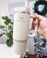 Stanley 40 oz Tumbler with Handle | Keeps Drinks Cold/Hot | Leak/Spill Proof | Fits Most Cup Holders | Dishwasher Safe. 