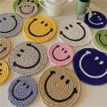 Korean smiley handmade cotton thread woven placemat ins expression insulation pad coaster pot pad cute thick pad. 