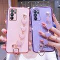 For OPPO Reno6 Pro 5G Back Cover with Love Heart Chain Wrist Strap Fashion Bracelet Shiny Plating Bumper Protective Case Silicone Shockproof Mobile Phone Cases. 