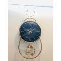 NEW 3D GLASS WALL CLOCK WITH SCREW HORN GOAT STRUCTURE ON TOP AND ROUND GLASS BOTTOM WITH PENDULUM FANCY AND ATTRACTIVE CLOCK IN BLACK GOLD COLOUR STYLISH DESIGN SMOOTH MACHINE WALL CLOCK HANGING WALL CLOCK HOME DECORATION PERFECT FOR YOUR LIVING ROOM. 