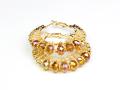 Golden Round Earring with Brown Beads And Zircons. 
