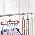 Mishbeeka 4-Pack - Super Magic Changeable Clothes Pluto Plastic Hanger Space Saving Saver Wonder Closet Organizer 9 Holes Holder Cloths and Pants Hanger. 