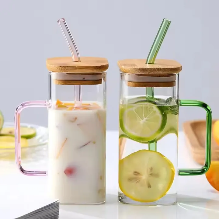 Aesthetic%20Glass%20Mug%20with%20Bamboo%20Cap%20&%20Reusable%20Straw%20%E2%80%93%20Pinterest%20Find%20Heat-Resistant%20Square%20Mug%20with%20Handle%20for%20Iced%20Beverages,%20Smoothies,%20Cocktails%20&%20Infused%20Water%20,%20Hot%20Drinks%20for%20Grils%20%7C%20%20Woman%20-%20Image%202