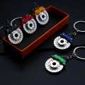 Creative gift car metal keychain turbo gear hub pendant brake disc shock absorber Pendant. Metal Gear Box keychain and Disk Brake Metal Keychain Style Car Key Chain Gear Shift Knob Key Ring Gift / Stylish Metal Gear Box Design Car Key Chain. 