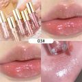 Explosion Shining Lipstick Moisturizing Glitter Jelly Liquid Lip Gloss Long Lasting Transparent Shining Lip Tint. 