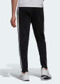 Adidas ESSENTIALS WARM-UP TAPERED 3-STRIPES TRACK PANTS. 