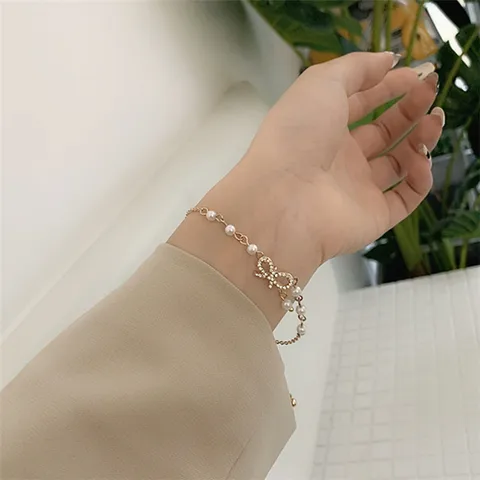 Korean%20Pearl%20Bracelet%20with%20Charm%20Crystal%20Bow%20For%20Girls%20Pearl%20Link%20Chain%20Bow%20Knot%20Bracelet%20Jewelry%20for%20Women%20-%20Image%206