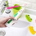 Pack of 4 Cartoon Animal Toothpaste Dispenser Plastic Tooth Paste Tube Squeezer Cute Rolling Holder For Tube Bathroom Products. 