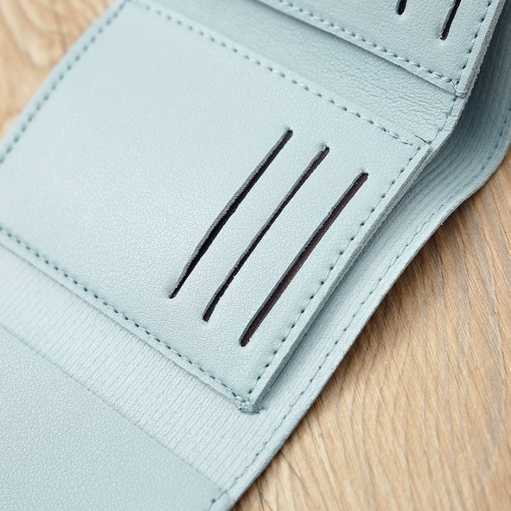 Fancy%20Small%20Hand%20Clutch%20for%20Girls,%20Compact%20PU%20Fabric%20with%207%20Card%20Slots,%20Button%20Closure,%20Trendy%20Design%20-%20Image%208