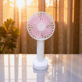 Portable Handheld USB Rechargeable Fan with Phone Holder - Compact and Lightweight. 