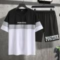 Summer Men Letter Graphic Color Block Tee & Drawstring Waist Shorts Track suit for Summer. 