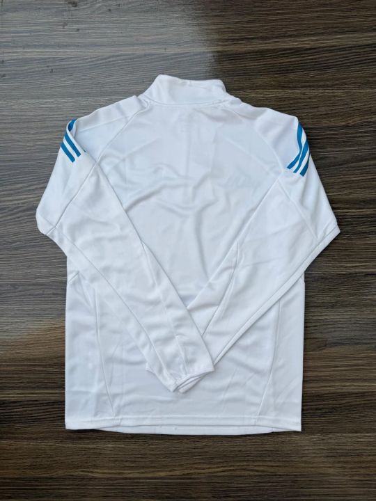 Real%20Madrid%202025/26%20Premium%20Training%20Drill%20Top%20%E2%80%93%20Full%20Sleeves%20%7C%20Replica-Style%20Adidas%20White%20&%20Sky%20Blue%20Training%20Sweatshirt%20%7C%20Men%E2%80%99s%20Football%20Jersey%20Top%20Pakistan%20%7C%20New%20Sportswear%20Arrival%20-%20Image%202