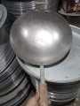 black iron Chinese fried rice and Manchurian wok with wood handle  a lifetime warranty. 