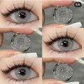 Eye contact lense eye care lense party wear lense in grey shade. 