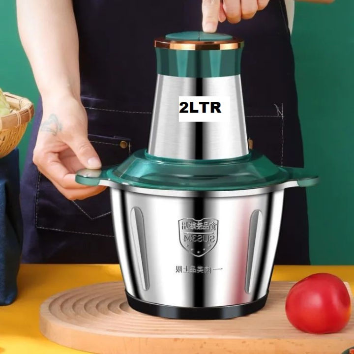Chopper%20Machine%20-%206L/3L%20Chopper%20-%20Kitchen%20Accessories%20-%20Hand%20Chopper%20-%20Blender%20Machine%20-%20Handblender%20-%20Meat%20Grinder%20-%20Grinder%20Machine%20-%20Chopper%20Machine%20Electric%20-%20Meat%20Chopper%20-%20Mixer%20-%20Food%20Processor%20-%20Qeema%20Machine%20-%20Electric%20Chopper%20-%20Vegetable%20Cutter.%20-%20Image%204