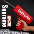Supreme The Original Cash Canon Money Gun_Toy. 