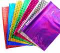 Pack of 10 Shiny Gift Wrapping Paper Sheets 20 x 30 Inch Random Colours. 