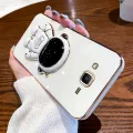 For Samsung Galaxy Grand Prime / Grand Prime Plus Back Cover with Cartoon Astronaut Folding Stand Luxury 6D Plating Frame Shiny Cases Soft Silicone Square Protective Mobile Phone Case. 
