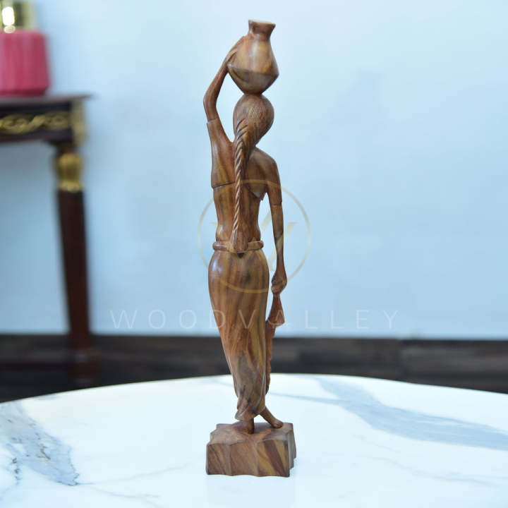 Wooden%20Hand%20Carved%20Native%20Women%20Cultural%20Sculpture-Wooden%20Woman%20Figurine%20Statue%20Hand%20Carved%20Tribal%20Art%20Sculpture-Folk%20Art%20Teak%20Wood%20Sculpture%20Hand%20Carved%20Native%20Woman%20Carrying%20Water%20-%20Image%204