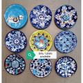 Blue Pottery Wall Hanging Plates........only one plate...Special Introductory Price  !!!!!!. 