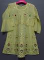 Cute and Beautiful Light Yellow Paper Cotton Rich Embroidered Kurti With Slip Inside For Girls. 