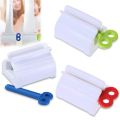 1 Pcs Plastic Rotary Easy Squeeze Toothpaste Holder Roller- Durable Rolling Tube Paste Squeezer & Dispenser - Manual Rotary Paste Holder. 