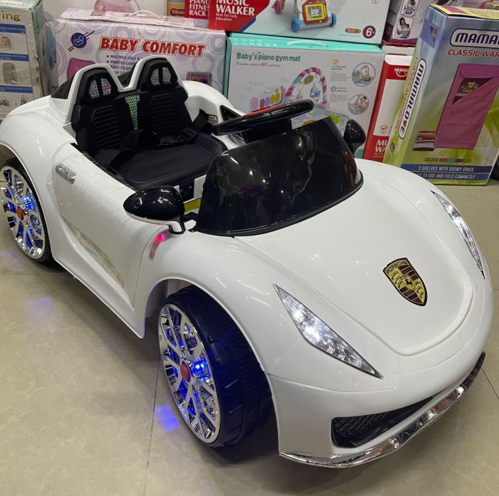 Kids%20Electric%20Car%20Remote%20and%20Self-Drive,%20Door%20Open%20option%20Push%20Start%20With%20Music%20USB%20Option,%202%20Battery%203%20Motors,%20With%20Rocking%20Wide%20Sitting%20Space%20Imported%20Made%20-%20Image%204