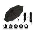 folding black umbrella with a silver coating inside the umbrella. 