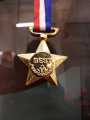 Pack of 4 Medal - Sports Reward -Plastic Medal with 2 Color Strip - Emboded medal - Star Shaped model - Sport medal. 