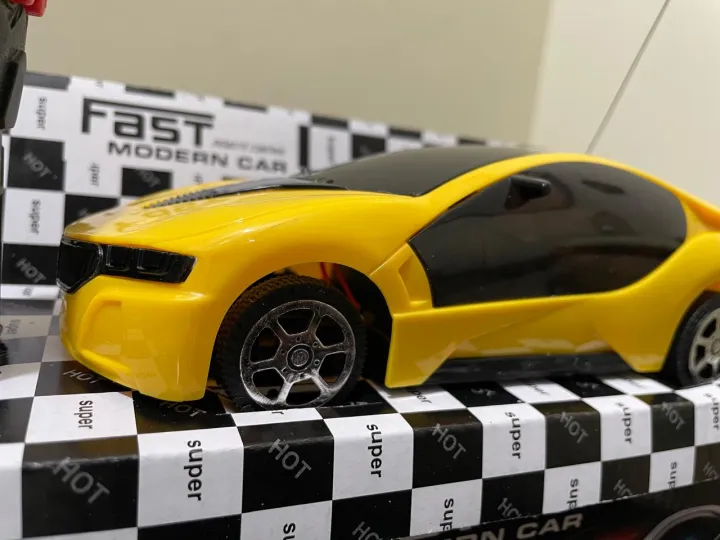 Remote%20Control%20High%20Speed%20Racing%20Car%20with%20Stylish%20Looks,%20Two%20Functions%20&%20Modern%20Design,%20RC%20Vehicle%20Toy%20for%20Kids%20-%20Image%204