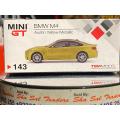 Mini GT # 143 BMW M4 Austin Yellow Metallic with safe box sealed Diecast Metal Toys Gifts for Kids 1/64 Scale. 