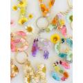 Resin flower keyring/ floral keyring/ keychain/ letter keyring/ gifts / keyring with tassel / keychain with tassel/ keyring. 