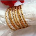 Artificial Golden Bangles (Guaranteed) with necklace. 