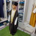 Rr Mall Presents Customized Stylish Premium Arabic Child Bisht Jubba for Kids -  Bisht for Boy's and Kid’s – Islamic Muslim Traditional Kid Boy Bisht Robe Thobe Half Sleeve Arabic Abaya Jubba - Available in all Colors and all Sizes. 